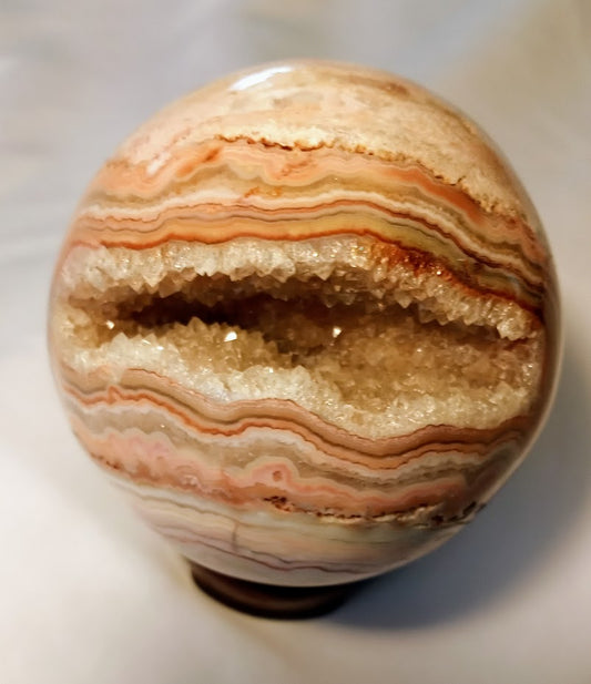 Crazy Lace Agate Sphere with Large Druzy Pocket