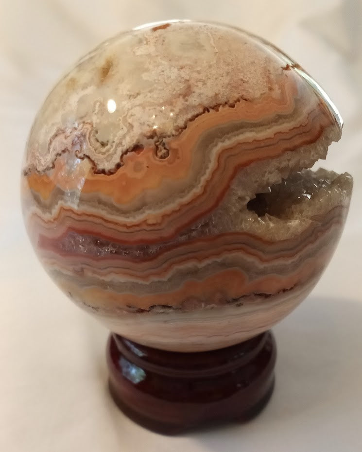 Crazy Lace Agate Sphere with Large Druzy Pocket